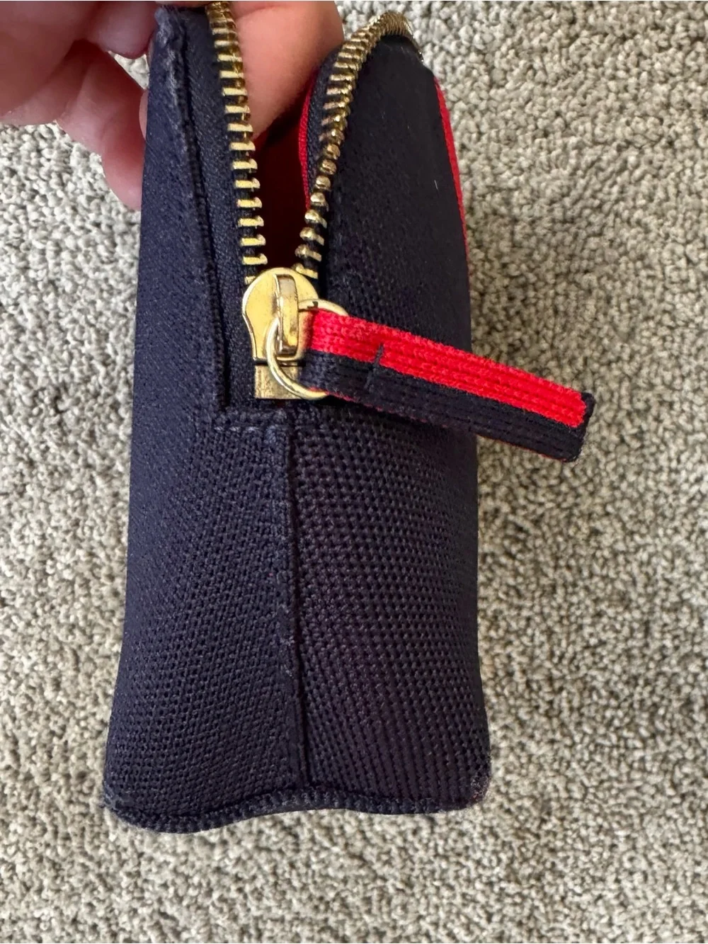 Rothy's Navy Cosmetic Pouch with Red Center Stripe